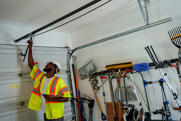Professional Garage Door Panel Replacement technician working in Bressler, PA